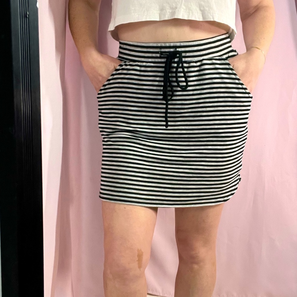 Mini skirt black and light grey striped with pockets stretchy. Made by ReneeC